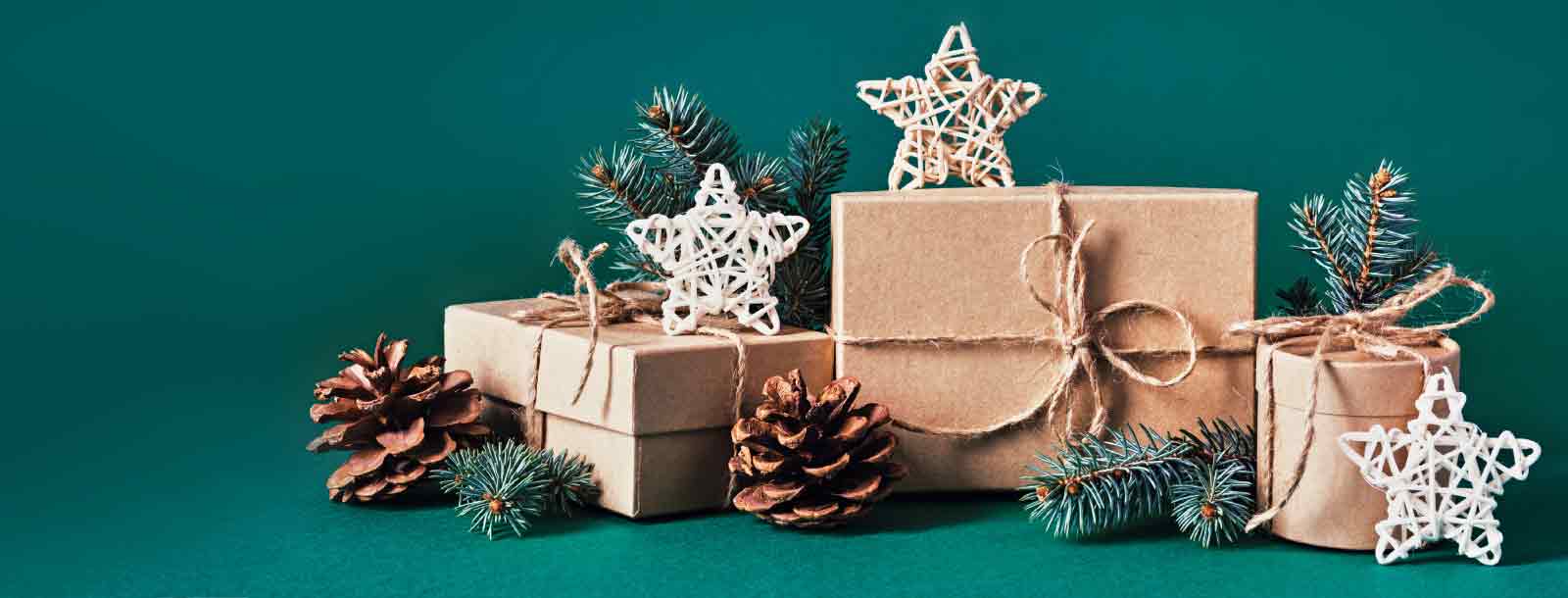 Gift Boxes with Pine Cones, Pine Needles and Star Ornaments